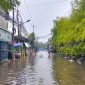 Jalan Pos Polisi Kapuk, Jakarta Barat Tergenang Air (Foto: Tikampost)
