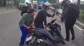 Kondisi Jalan Daan Mogot, Jakarta Barat, yang dipenuhi lubang 