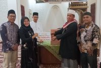 Wakil Bupati Leli Arni memimpin langsung Tim II Safari Ramadhan Pemerintah Kabupaten Dharmasraya dalam kunjungan perdana ke Masjid Jamik, Nagari Timpeh, Kecamatan Timpeh, Senin (23/2/2026).